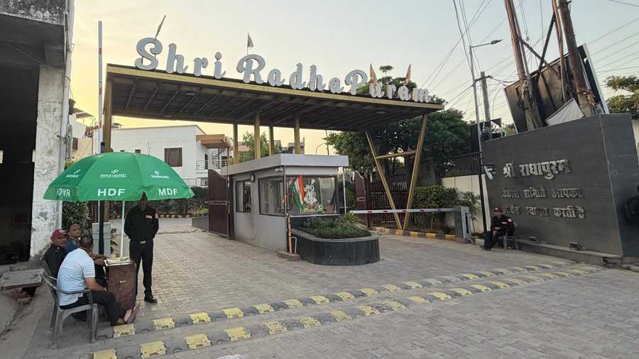 Greenpanel branded umbrella at the Shri RadhaPuram residential gate