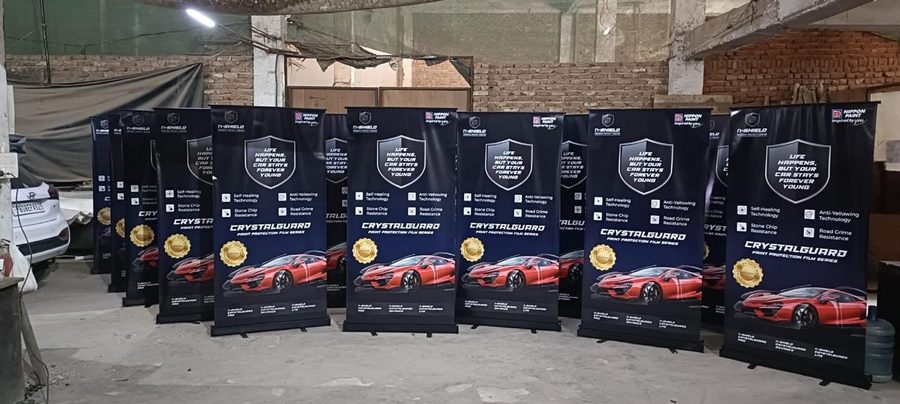 A row of fabricated Nippon Paints CrystalGuard standees