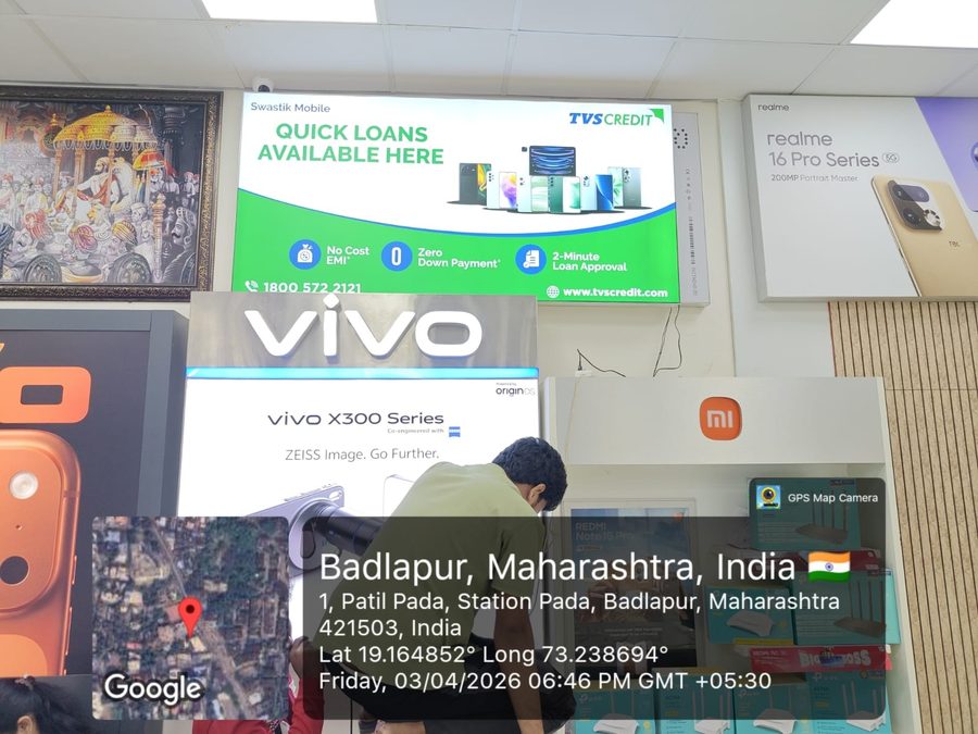 TVS Credit in-store display at a mobile store in Badlapur, Maharashtra, geo-tagged